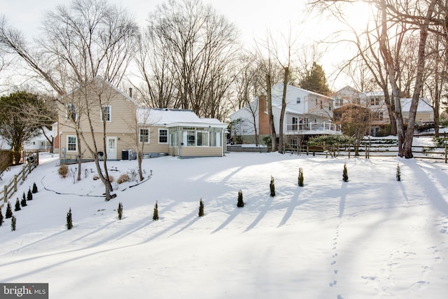 view of yard layered in snow