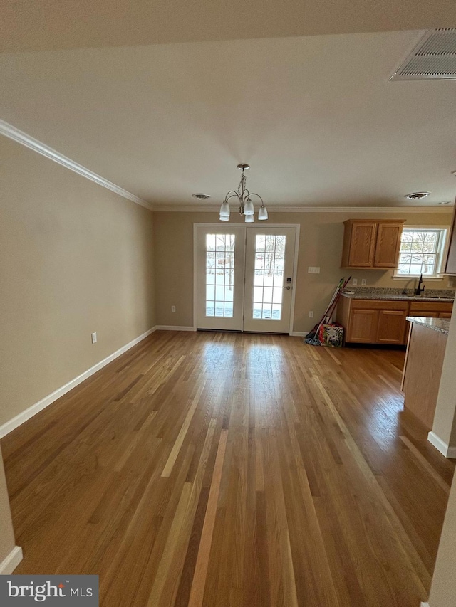 1689 Gerrardstown Rd, Gerrardstown, WV 25420 - interior space with sink, hardwood / wood-style floors, ornamental molding, and a notable chandelier