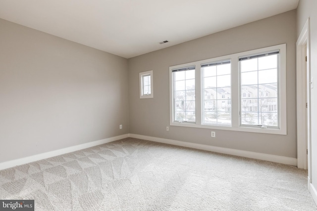 view of carpeted spare room