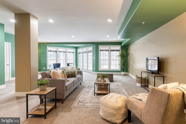 living room with light colored carpet