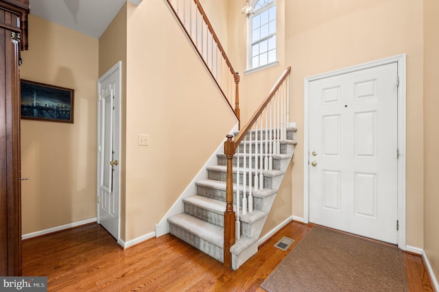 entryway with wood-type flooring