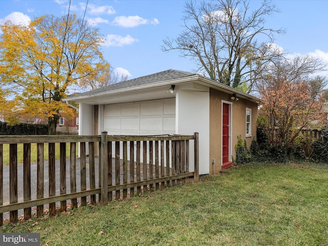 view of side of property with a yard