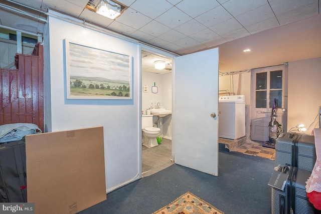 basement featuring separate washer and dryer