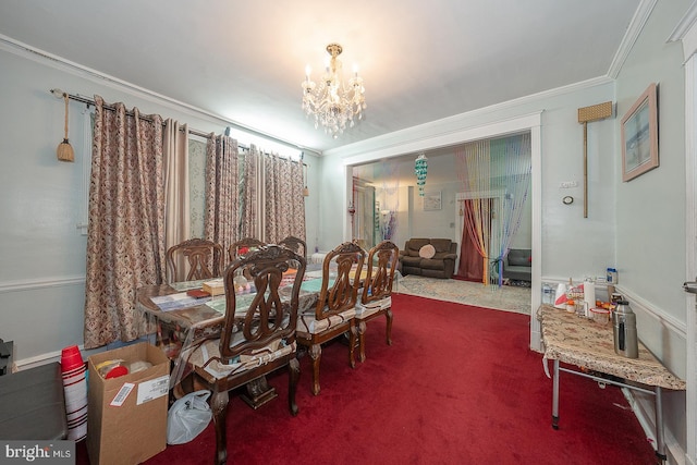 dining area with carpet flooring, crown molding, and a notable chandelier