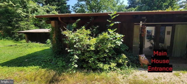 exterior space with a lawn