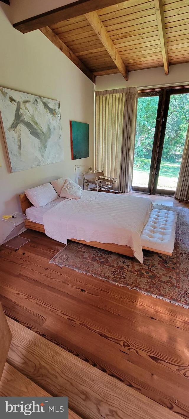 unfurnished bedroom with wood ceiling, beamed ceiling, and wood-type flooring