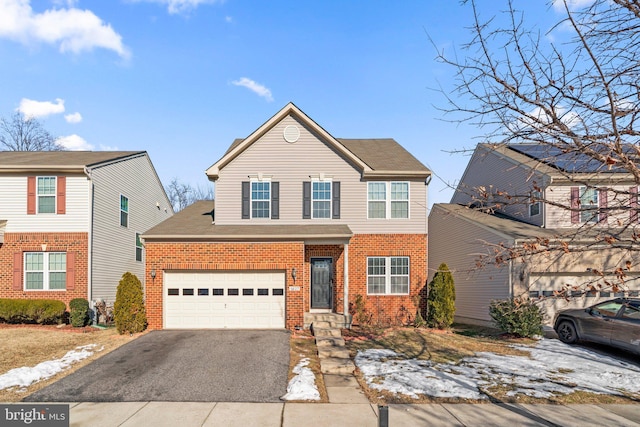 front of property with a garage