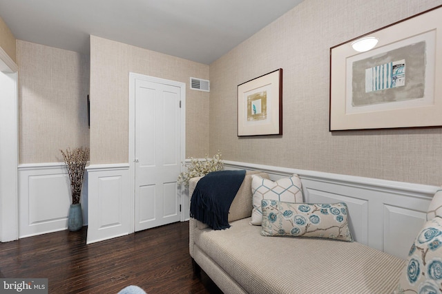 bedroom featuring dark hardwood / wood-style flooring