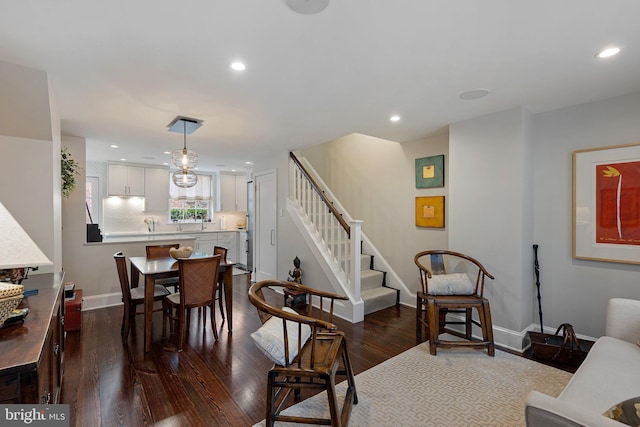 living room featuring dark hardwood / wood-style floors