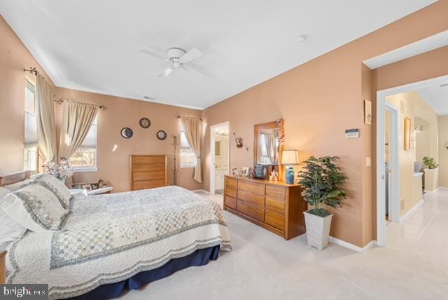 bedroom featuring ceiling fan and light colored carpet