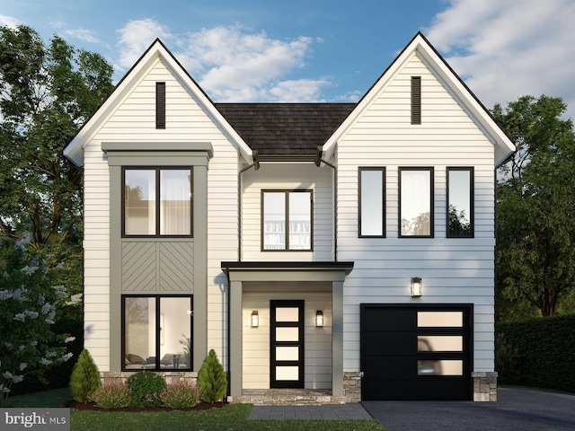 view of front of home with a garage