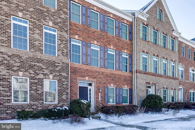 view of snow covered property