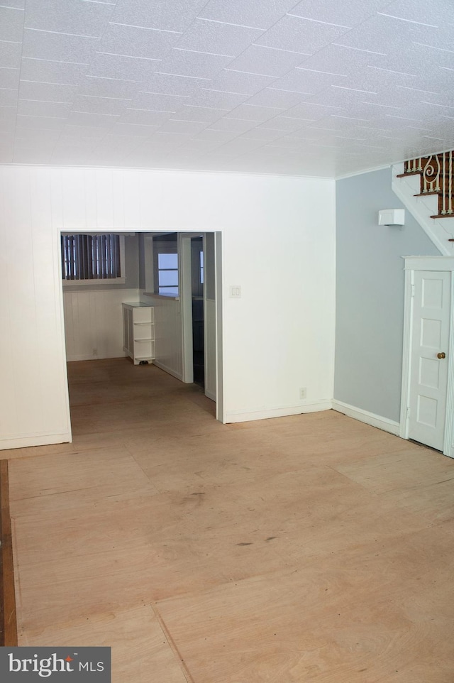 spare room with light hardwood / wood-style floors