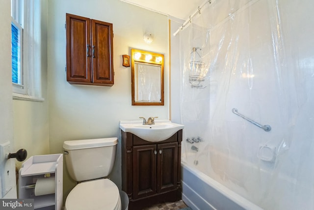 full bathroom with vanity, toilet, and shower / tub combo with curtain