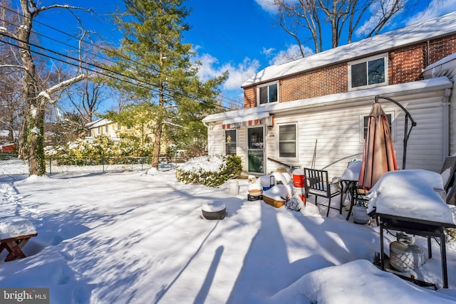 view of snow covered property