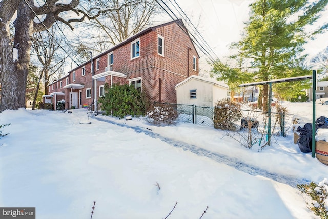 view of snow covered property