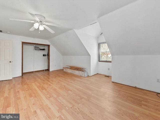 bonus room with ceiling fan, vaulted ceiling, and light hardwood / wood-style flooring