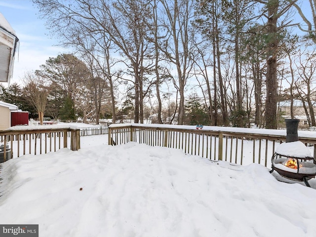 view of snow covered deck