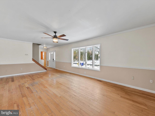 unfurnished room featuring ceiling fan, light hardwood / wood-style flooring, and ornamental molding