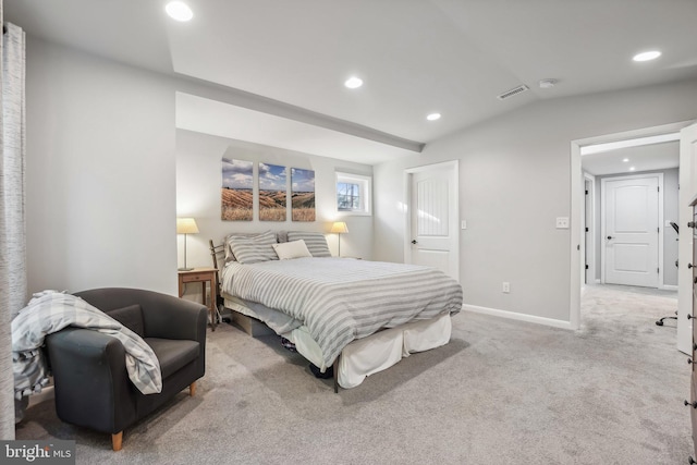 carpeted bedroom featuring vaulted ceiling