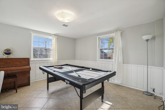 playroom with light tile patterned floors