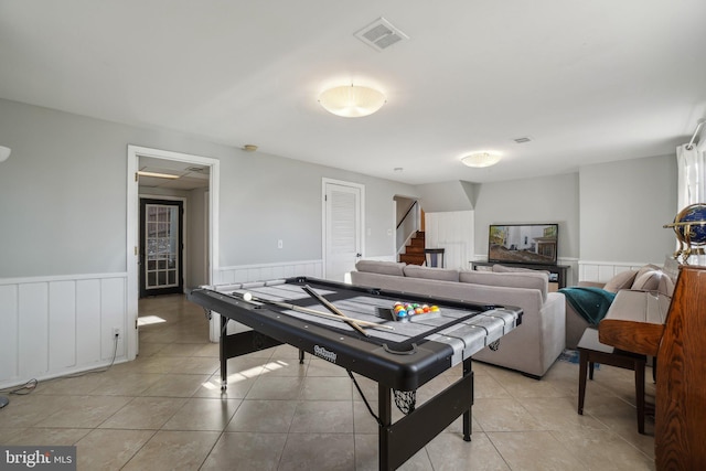 recreation room featuring light tile patterned flooring