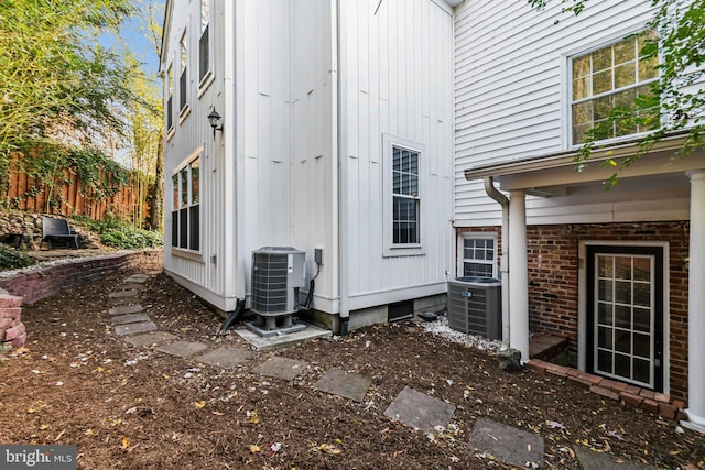 view of property exterior with cooling unit