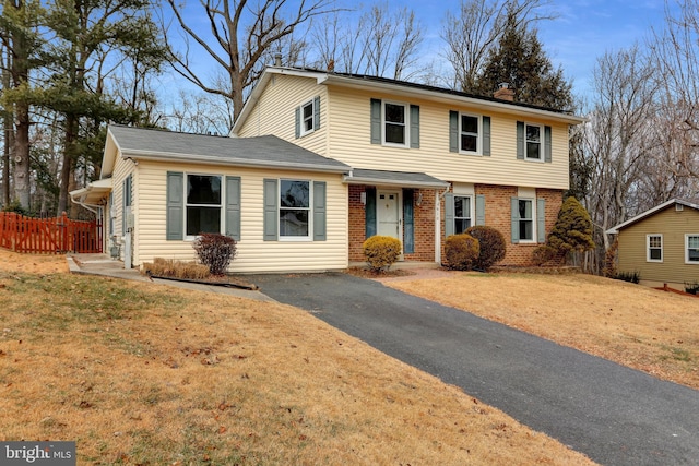 front of property with a front yard