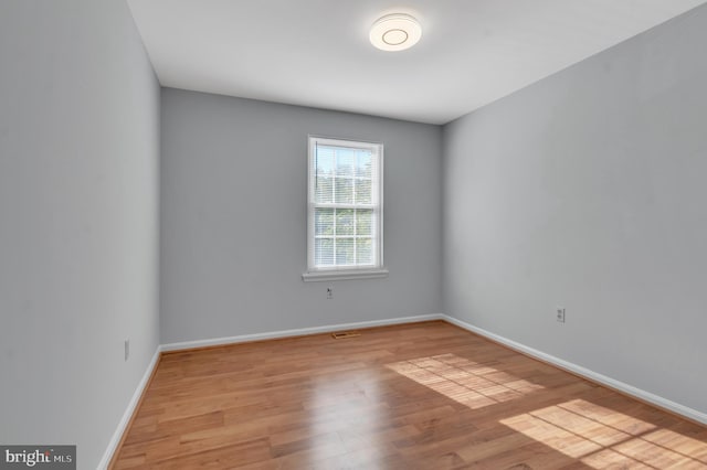 empty room featuring light hardwood / wood-style floors