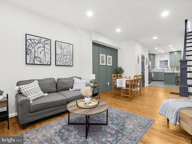 living room featuring light wood-type flooring