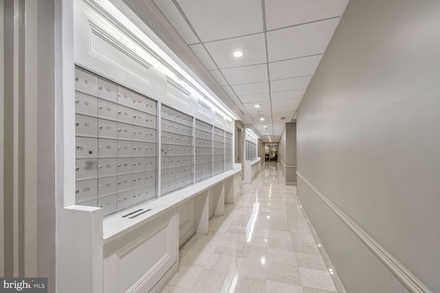 hallway featuring mail boxes