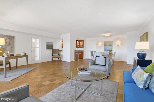 living room with crown molding