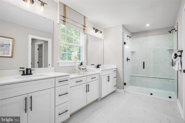 bathroom featuring vanity and walk in shower