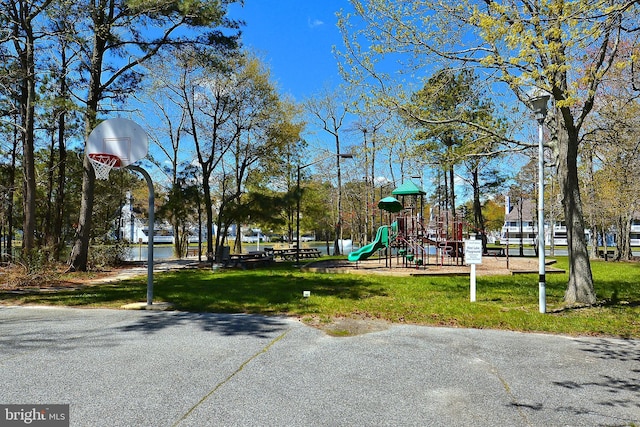 39281 Piney Dr Unit 55115, Bethany Beach, DE 19930 - community play area featuring a lawn and community basketball court