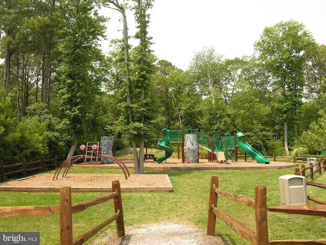 39281 Piney Dr Unit 55115, Bethany Beach, DE 19930 - community playground featuring a yard and fence