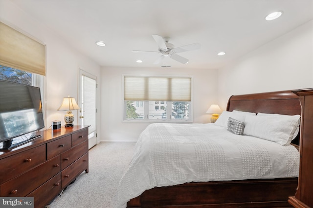 carpeted bedroom with ceiling fan