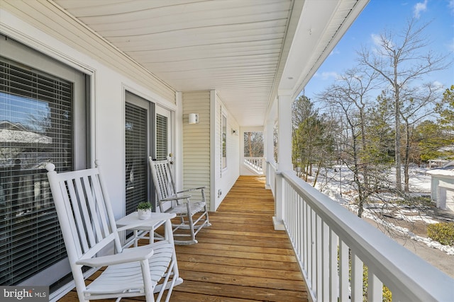 view of snow covered deck