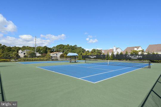 39281 Piney Dr Unit 55115, Bethany Beach, DE 19930 - view of sport court with fence and community basketball court