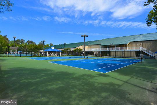 39281 Piney Dr Unit 55115, Bethany Beach, DE 19930 - view of tennis court with fence