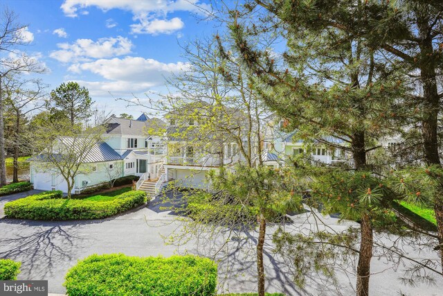 39281 Piney Dr Unit 55115, Bethany Beach, DE 19930 - surrounding community featuring stairs and aphalt driveway