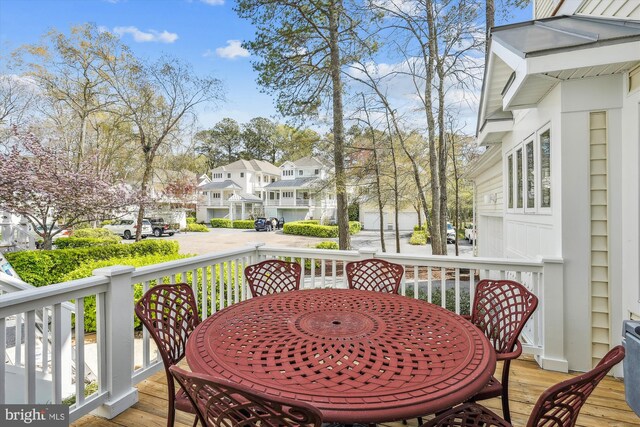 39281 Piney Dr Unit 55115, Bethany Beach, DE 19930 - wooden terrace with a residential view and outdoor dining space
