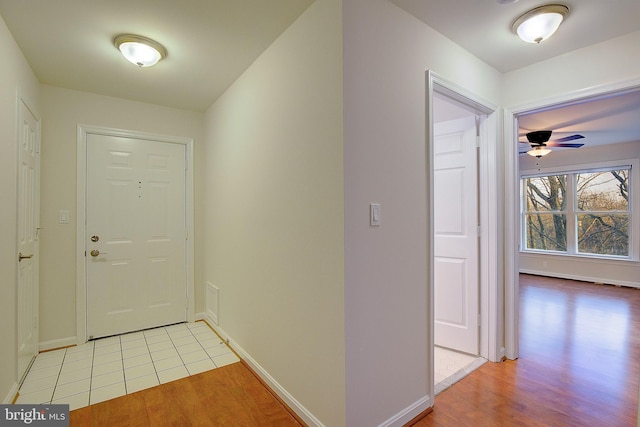 interior space featuring ceiling fan and light hardwood / wood-style flooring