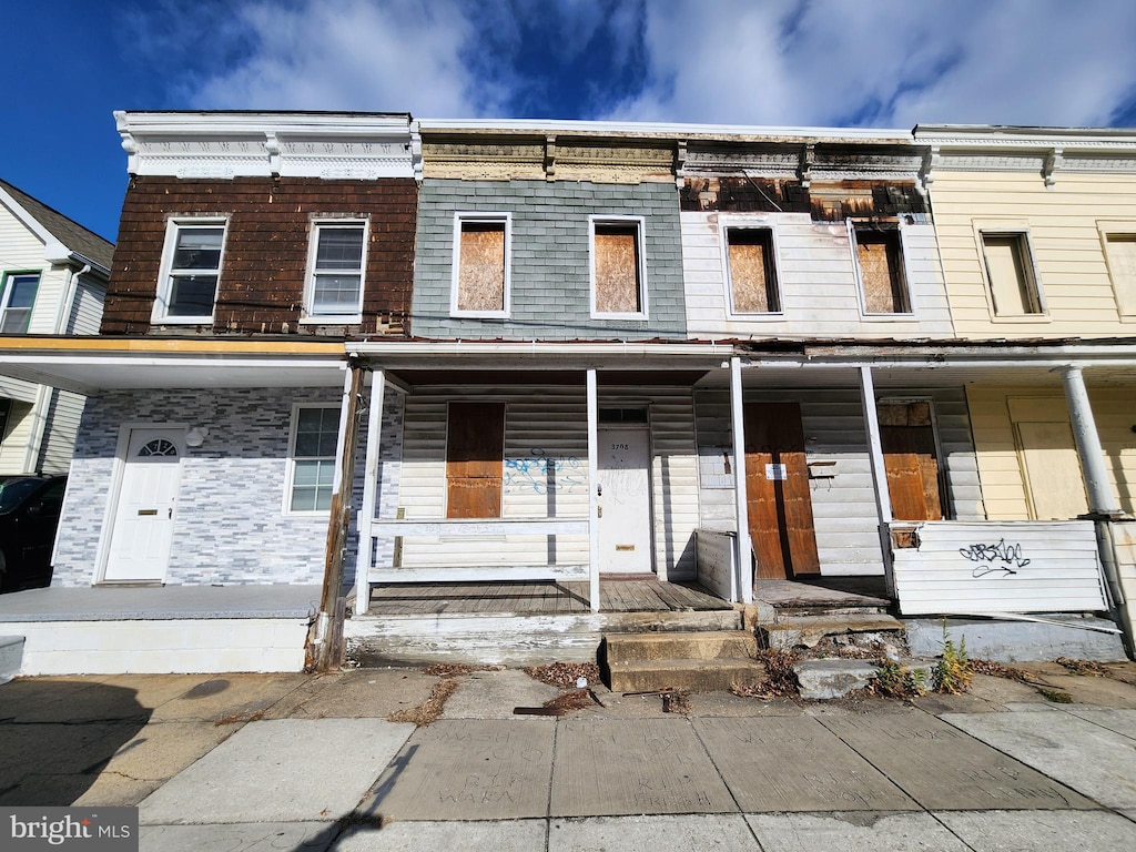 multi unit property featuring covered porch