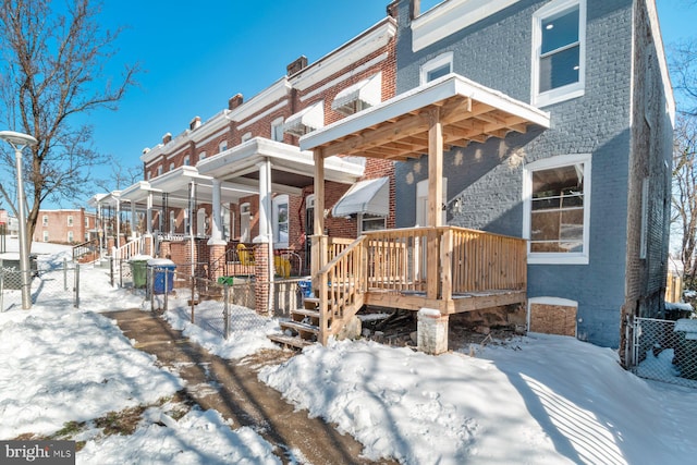 view of snow covered property