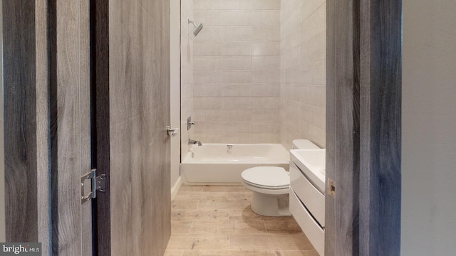 full bathroom with vanity, shower / bathtub combination, and toilet