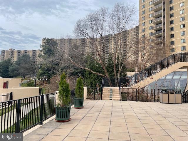 view of patio / terrace featuring stairs