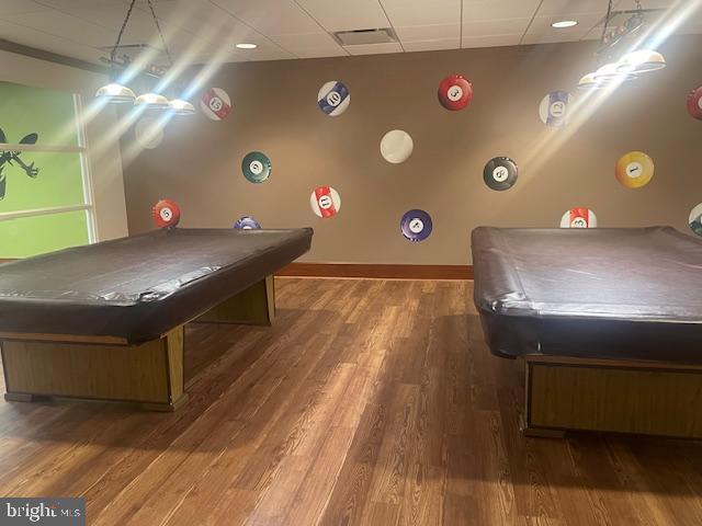 recreation room featuring baseboards, visible vents, dark wood-type flooring, and pool table