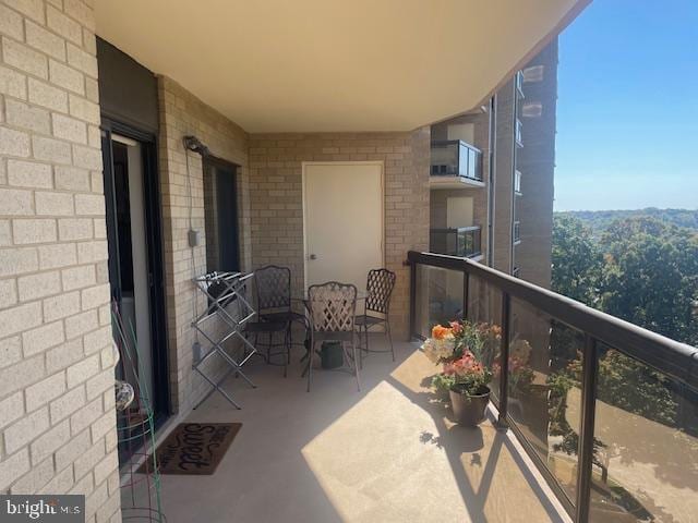 balcony featuring a sunroom