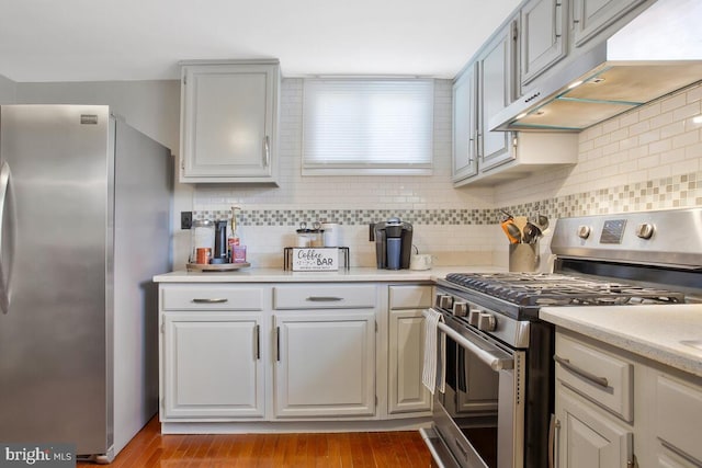 kitchen featuring backsplash and appliances with stainless steel finishes