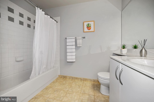 full bathroom with tile patterned flooring, shower / tub combo with curtain, vanity, and toilet